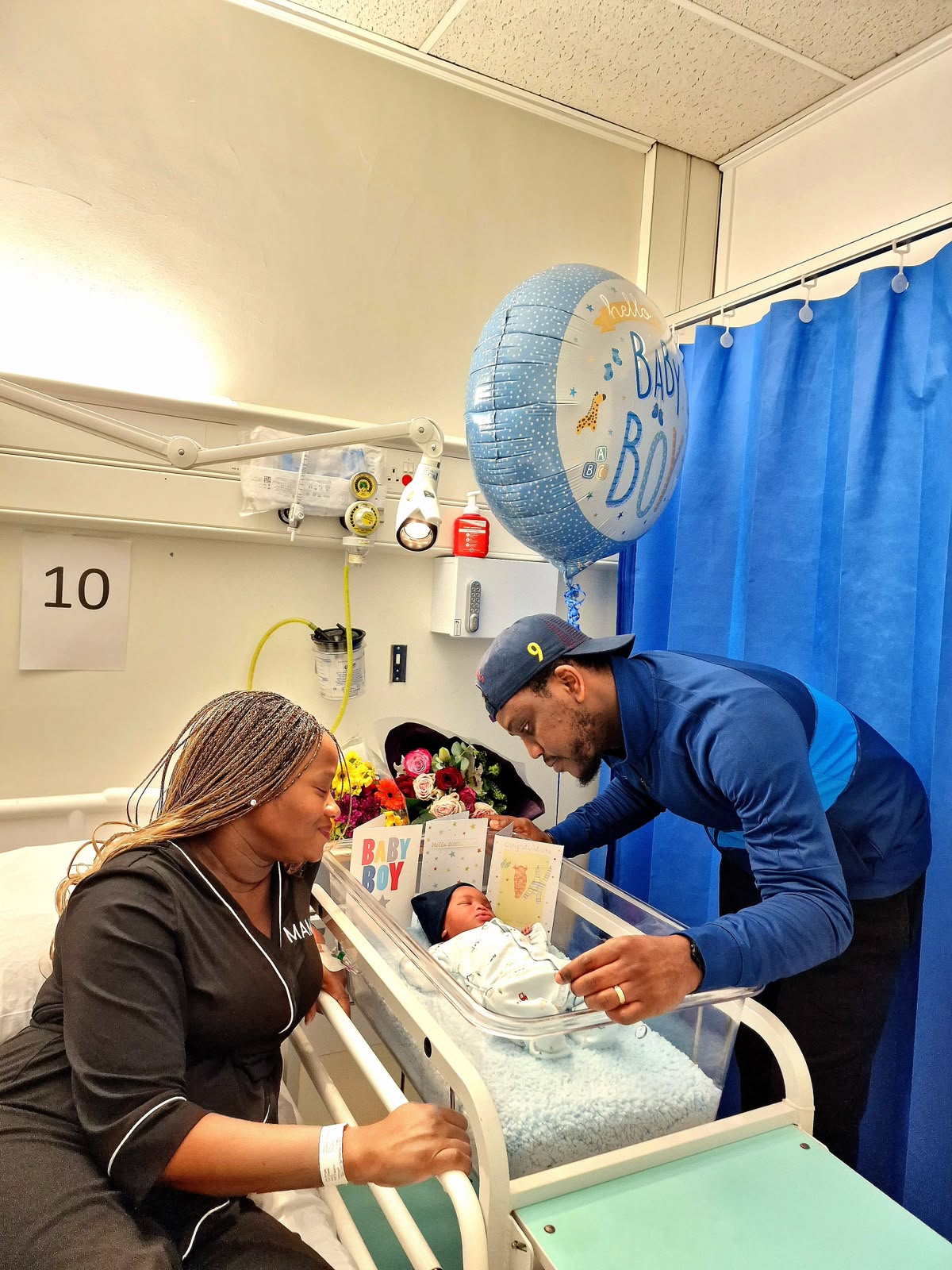 Dad with his baby in hospital